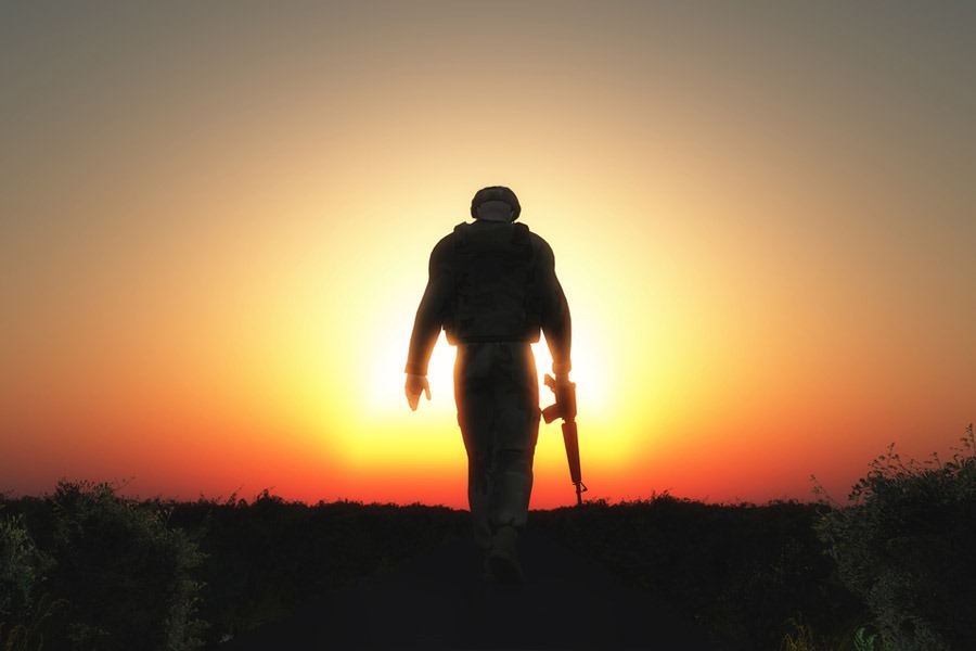3D render of a sodier walking with his head down at sunset